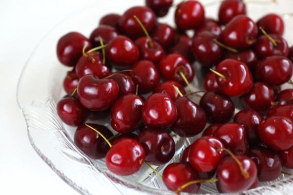 Cherries On A Plate by Joy Watson